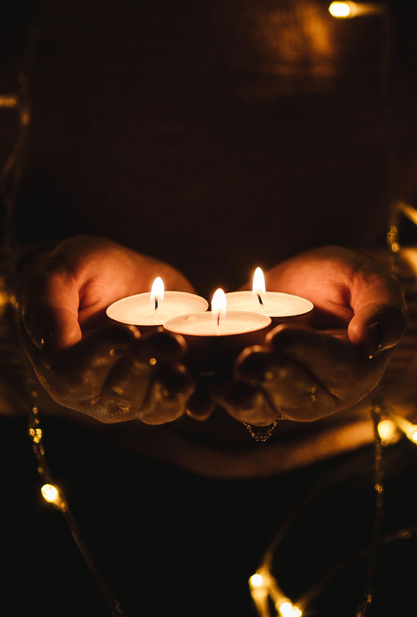 women-holding-candles